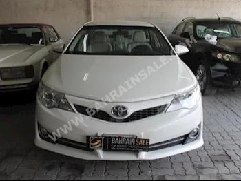 Toyota  Camry  GL  2013  Sedan  Automatic  4  89,000  FWD  White  Gasoline