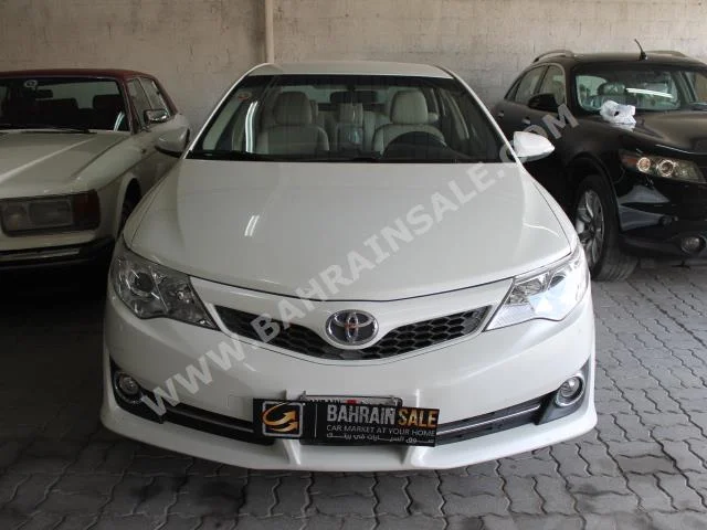 Toyota  Camry  GL  2013  Sedan  Automatic  4  89,000  FWD  White  Gasoline
