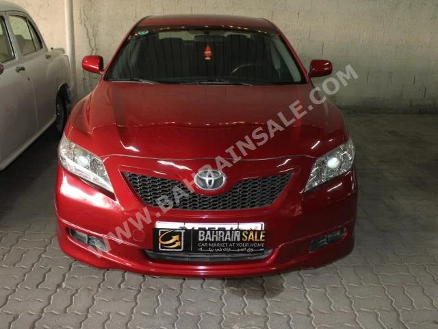 Toyota  Camry  SE  2007  Sedan  Automatic  4  180,000  FWD  Red  Gasoline