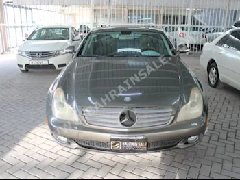 Mercedes-Benz  CLS-Class  500  2005  Sedan  Automatic  6  180,000  RWD  Gray  Gasoline