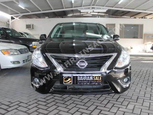 Nissan  Sunny  2016  Sedan  Automatic  4  9,000  FWD  Black  Gasoline