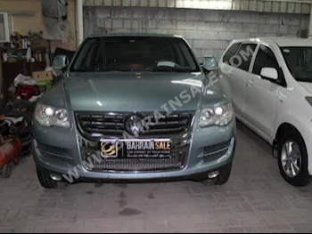Volkswagen  Touareg  2008  SUV  Automatic  6  98,000  4WD  Sky Blue  Gasoline