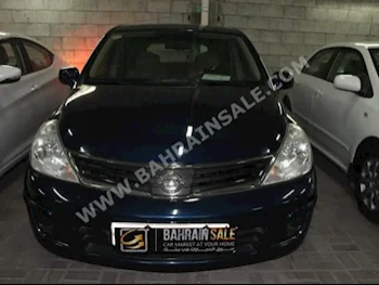 Nissan  Tiida  2013  Hatchback  Automatic  4  84,000  FWD  Dark Blue  Gasoline