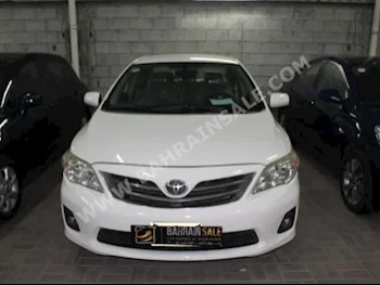 Toyota  Corolla  XLI  2012  Sedan  Automatic  4  127,000  FWD  White  Gasoline