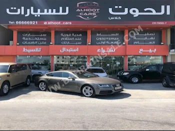 Audi  A7  3.0 T-Quattro  2012  Sedan  Automatic  6  96,000  AWD  Dark Brown  Gasoline