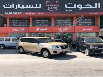 Nissan  Patrol  XE  2014  SUV  Automatic  8  120,000  4WD  Light Gold  Gasoline