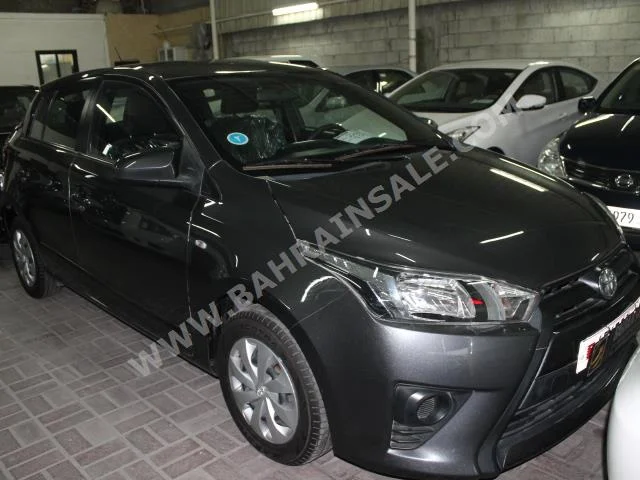Toyota  Yaris  2015  Hatchback  Automatic  4  7,700  FWD  Gray  Gasoline