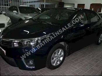Toyota  Corolla  2014  Sedan  Automatic  4  124,000  FWD  Blue  Gasoline