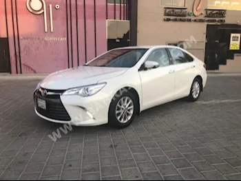Toyota  Camry  GL  2017  Sedan  Automatic  4  117,000  FWD  White  Gasoline