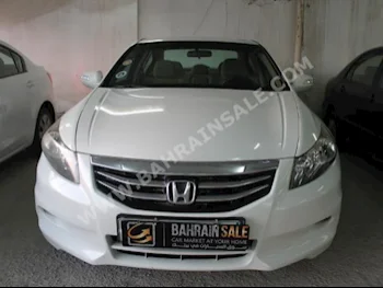 Honda  Accord  2012  Sedan  Automatic  4  90,000  FWD  White  Gasoline
