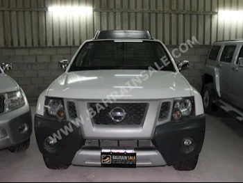 Nissan  Xterra  2012  SUV  Automatic  6  90,000  4WD  White  Gasoline