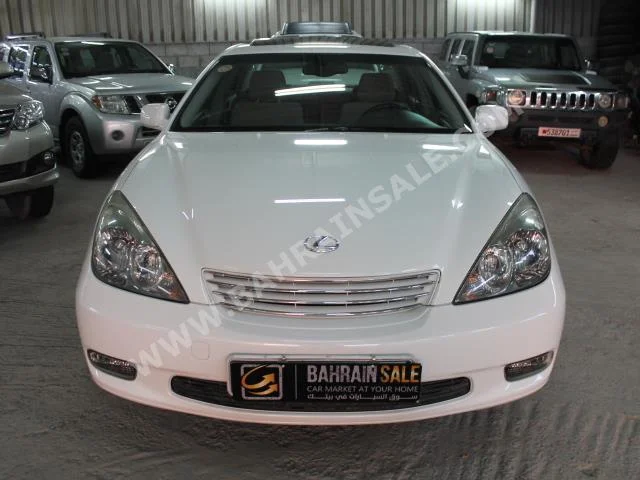Lexus  ES  300  2003  Sedan  Automatic  6  300,000  FWD  White  Gasoline