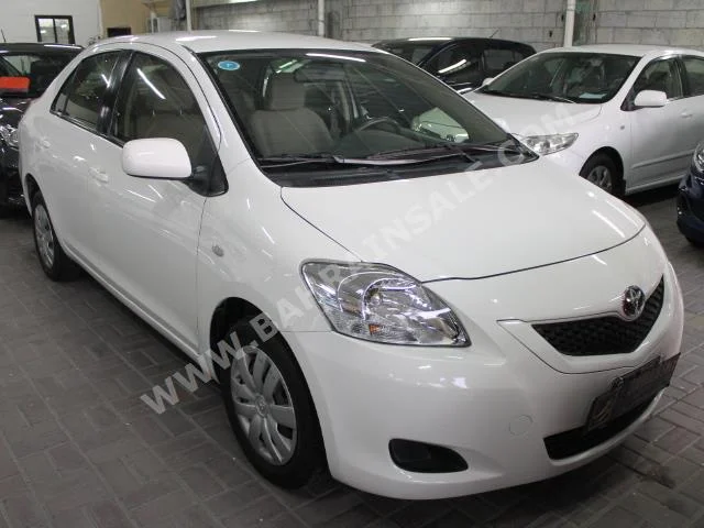 Toyota  Yaris  2013  Sedan  Automatic  4  84,000  FWD  White  Gasoline