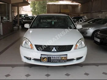 متسوبيشي  لانسر  2013  سيدان  اتوماتك  4  88,000  دفع أمامي  أبيض  بنزين