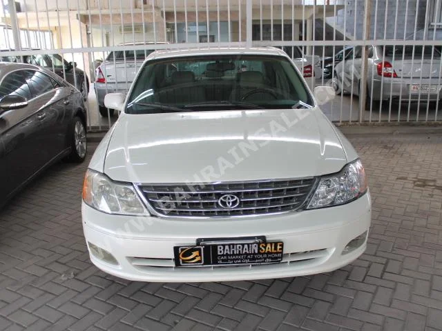 Toyota  Avalon  XLE  2004  Sedan  Automatic  6  209,000  FWD  White  Gasoline