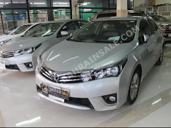 Toyota  Corolla  XLI  2014  Sedan  Automatic  4  74,000  FWD  Silver  Gasoline