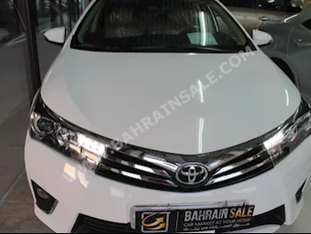 Toyota  Corolla  GLI  2015  Sedan  Automatic  4  41,000  FWD  White  Gasoline