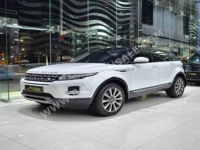 Land Rover  Evoque  2014  SUV  Automatic  4  75,000  4WD  White  Gasoline