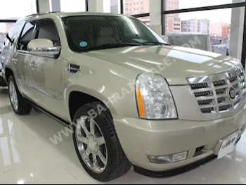 Cadillac  Escalade  2007  SUV  Automatic  8  95,000  RWD  Gold  Gasoline