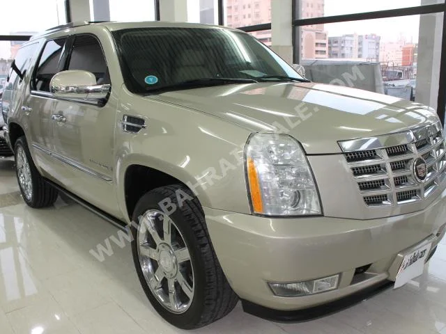 Cadillac  Escalade  2007  SUV  Automatic  8  95,000  RWD  Gold  Gasoline