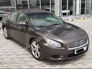 Nissan  Maxima  2012  Sedan  Automatic  6  114,400  RWD  Brown  Gasoline
