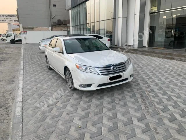 تويوتا  أفالون  لمتيد  2011  سيدان  اتوماتك  6  150,000  دفع خلفي  أبيض  بنزين