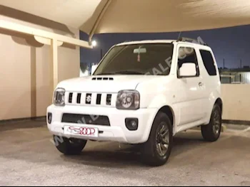 Suzuki  Jimny  2016  Coupe / Sport  Manual  4  100,000  FWD  White  Gasoline