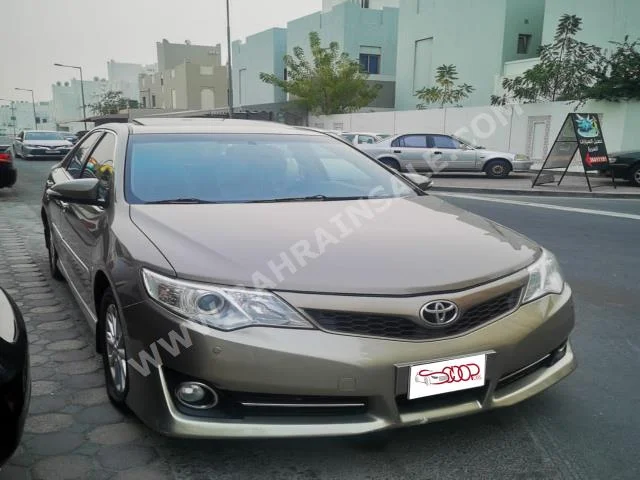 Toyota  Camry  GLX  2012  Sedan  Automatic  4  100,000  4WD  Gold  Gasoline