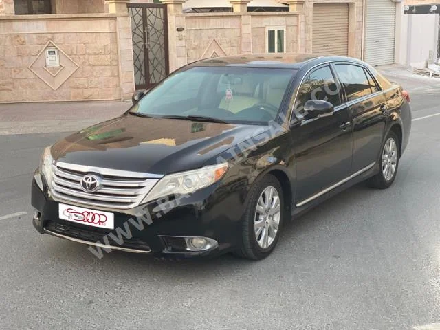 تويوتا أفالون اكس ال اي 2012 سيدان اتوماتك 6 140,000 دفع أمامي أسود بنزين