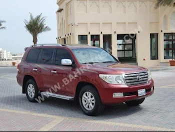 تويوتا لاند كروزر جي اكس ار 2011 فان \ باص اتوماتك 8 170,000 دفع رباعي أحمر بنزين