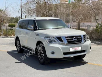 نيسان  باترول  اس اي  2015  فان \ باص  اتوماتك  8  200,000  دفع رباعي  أبيض  بنزين