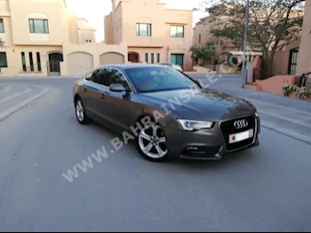 Audi  A5  1.8  2015  Sedan  Automatic  4  86,000  FWD  Bronze  Gasoline