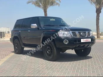 نيسان  باترول  سوبر سفاري  2004  فان \ باص  اتوماتك  6  300,000  دفع رباعي  أسود  بنزين
