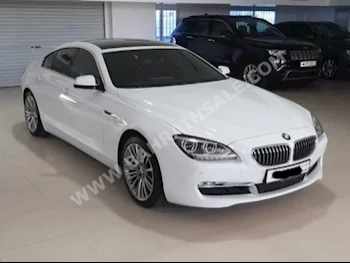 بي ام دبليو  الفئة - السادسة  650i  2014  سيدان  اتوماتك  8  94,800  دفع خلفي  أبيض  بنزين