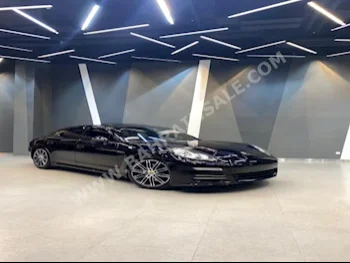Porsche  Panamera  4  2016  Sedan  Automatic  6  65,000  RWD  Black  Gasoline