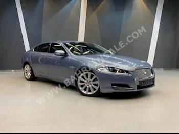 Jaguar  XF  V6 Supercharged  2014  Sedan  Automatic  6  56,000  RWD  Blue  Gasoline