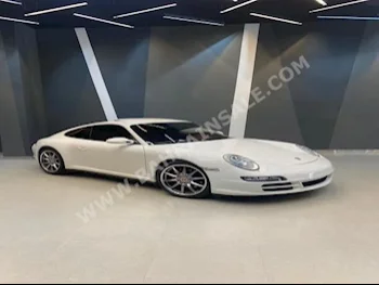 Porsche  911  Carrera 4S  2007  Coupe / Sport  Automatic  6  164,000  RWD  White  Gasoline