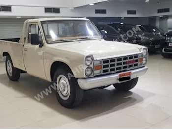 نيسان  بيك أب  1984  بيكب  عادي  4  0  دفع خلفي  بيج  بنزين