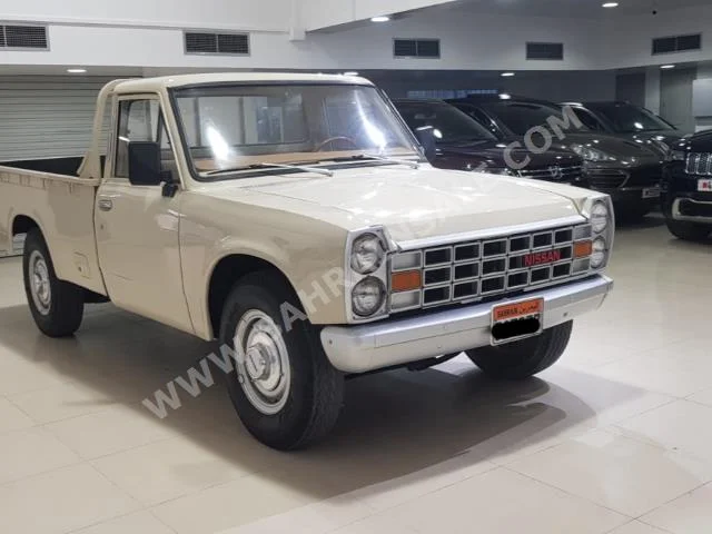 نيسان  بيك أب  1984  بيكب  عادي  4  0  دفع خلفي  بيج  بنزين