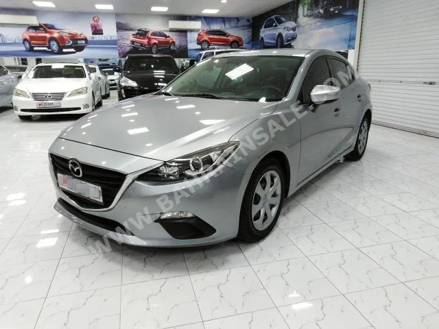 Mazda  Mazda 3  2016  Sedan  Automatic  4  106  FWD  Silver  Gasoline