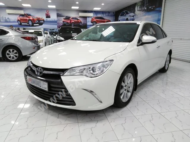 Toyota  Camry  GLX  2016  Sedan  Automatic  4  124  RWD  White  Gasoline