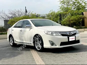 Toyota  Camry  GL  2014  Sedan  Automatic  4  140,000  FWD  White  Gasoline