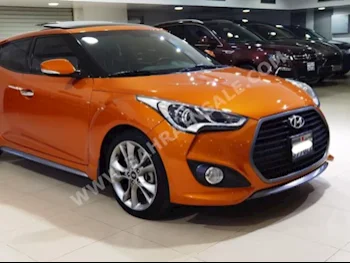 Hyundai  Veloster  2016  Hatchback  Automatic  4  59,200  FWD  Orange  Gasoline
