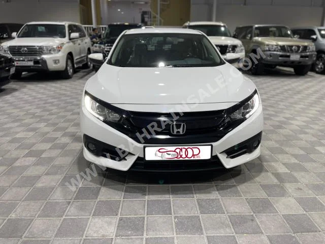 Honda  Civic  2019  Sedan  Automatic  4  50,000  FWD  White  Gasoline