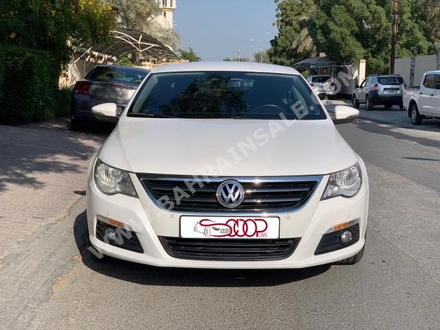 Volkswagen  Passat  CC  2012  Sedan  Automatic  4  150,000  FWD  White  Gasoline