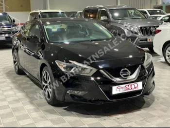 Nissan  Maxima  2016  Sedan  Automatic  6  120,000  FWD  Black  Gasoline