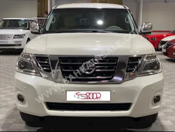 نيسان  باترول  اس اي  2015  فان \ باص  اتوماتك  8  200,000  دفع رباعي  أبيض لؤلؤي  بنزين