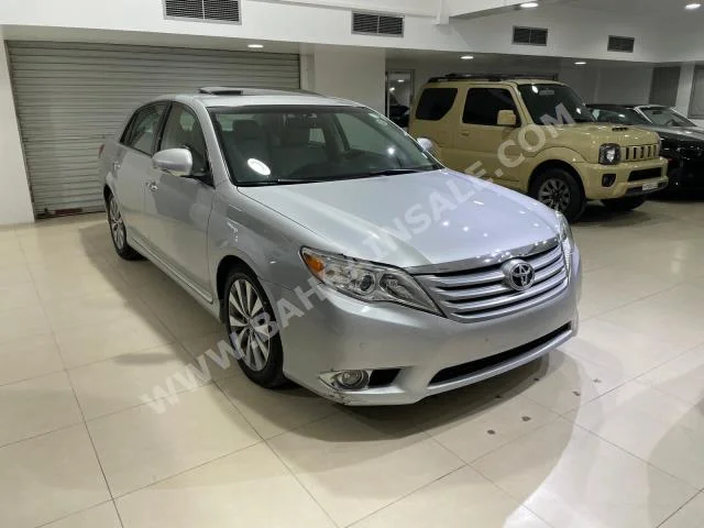 Toyota  Avalon  Limited  2012  Sedan  Automatic  6  42,200  RWD  Silver  Gasoline