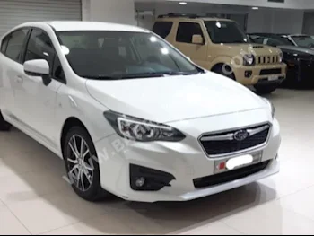 Subaru  Impreza  2017  Sedan  Automatic  4  78,300  FWD  White  Gasoline