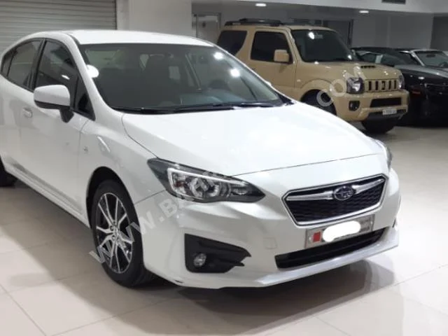 Subaru  Impreza  2017  Sedan  Automatic  4  78,300  FWD  White  Gasoline